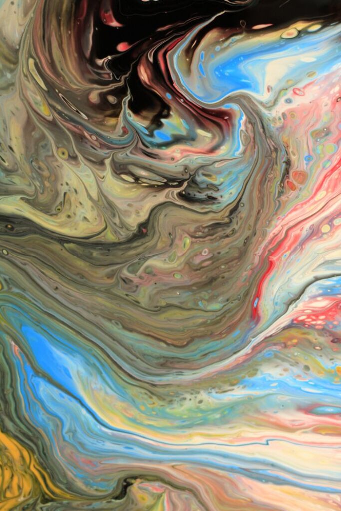 Vibrant abstract fluid art with swirling colors resembling fluid dynamics, ideal for modern aesthetics.